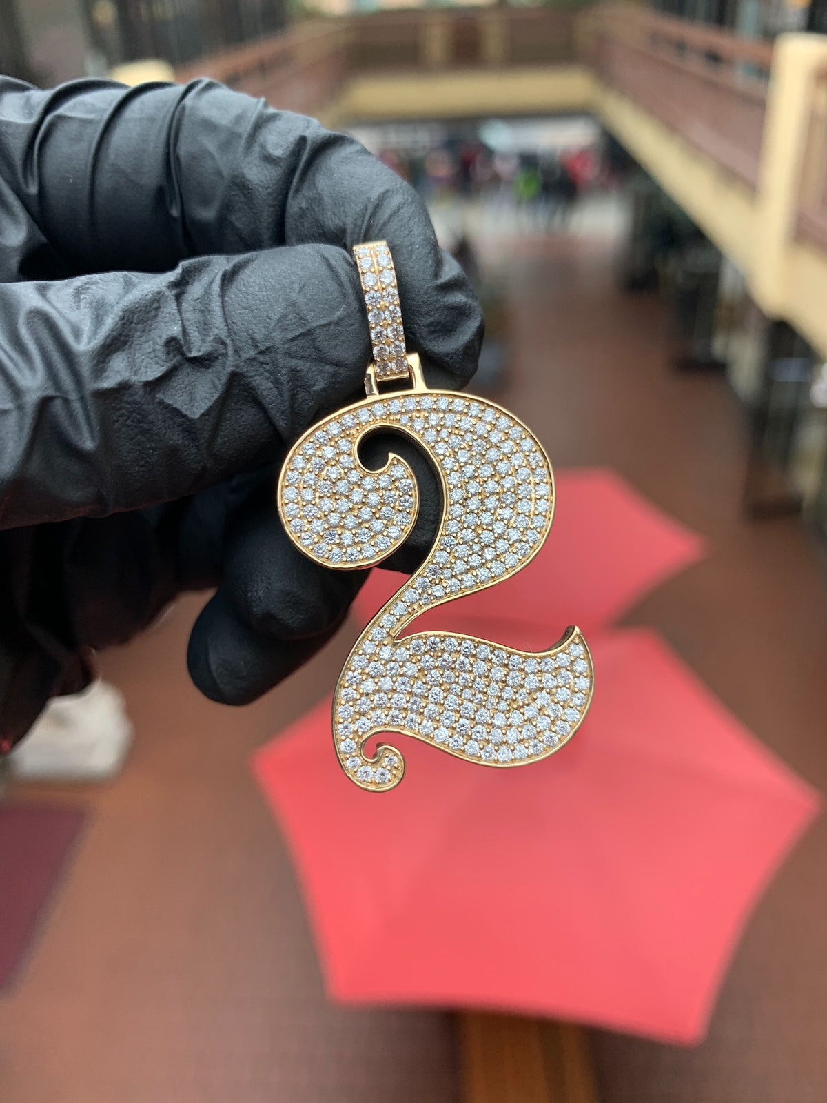 Yellow gold "2" Diamond Pendant, a swash numeral fully pave-set in round diamonds with a polished rim traced around both spirals and the tapering tail. Can be made as any number or letter.