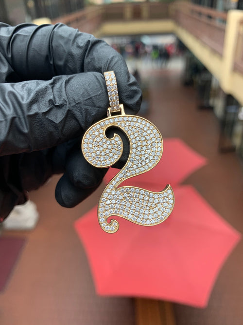 Yellow gold "2" Diamond Pendant, a swash numeral fully pave-set in round diamonds with a polished rim traced around both spirals and the tapering tail. Can be made as any number or letter.