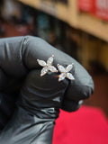 White gold Marquise Floral Cluster Stud Earrings, a pair of four-petal flowers each built from four marquise-cut diamonds set point-to-point with every tip in its own prong.