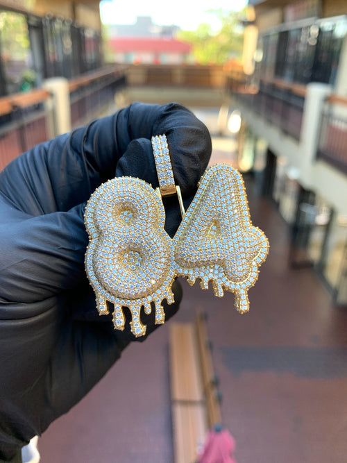Yellow gold "84" Diamond Pendant, two bubble numerals fully pave-set in round diamonds with dripping points hanging from the lower edge of each.