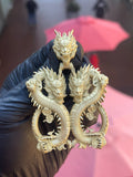 Solid gold 88 Dragon Pendant, two mirrored dragons coiled into the figure 88 with a third carved dragon head forming the bail above them.