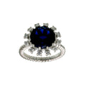 Rhodium Plated 925 Sterling Silver Blue Center Flower CZ Ring with Rope Band - BGR01302BLU