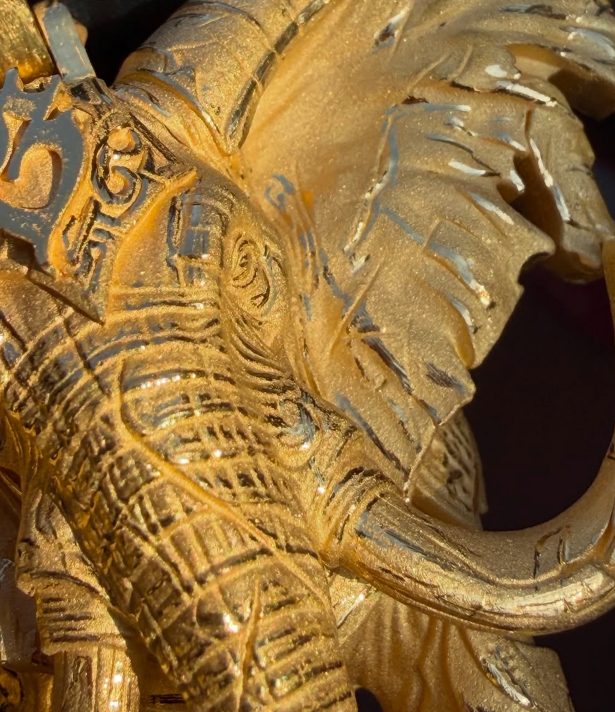 War elephant gold pendant, view showing the body cut through between the legs