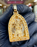Solid gold Diamond-Cut Aztec Corn Maize Cob Lord Pendant, the maize god in an arch frame with stepped greca fretwork and a diamond-cut ray burst