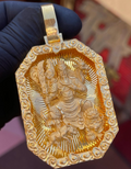 Gold Guan Gong pendant, the God of War with rooster, goat, pig and Foo Dog on a diamond-cut ray field in a carved cloud border