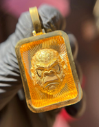 Solid gold Diamond-Cut Gorilla Face Rectangular Pendant, front view showing the carved gorilla face