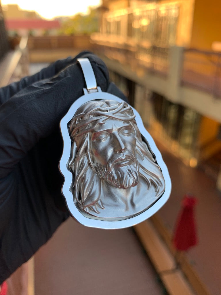 Solid gold Jesus pendant with eyes closed, face in deep satin relief with a carved crown of thorns