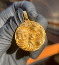 Solid gold Happy Buddha and Dragon Circular Pendant, laughing Budai sharing the disc with a coiled dragon