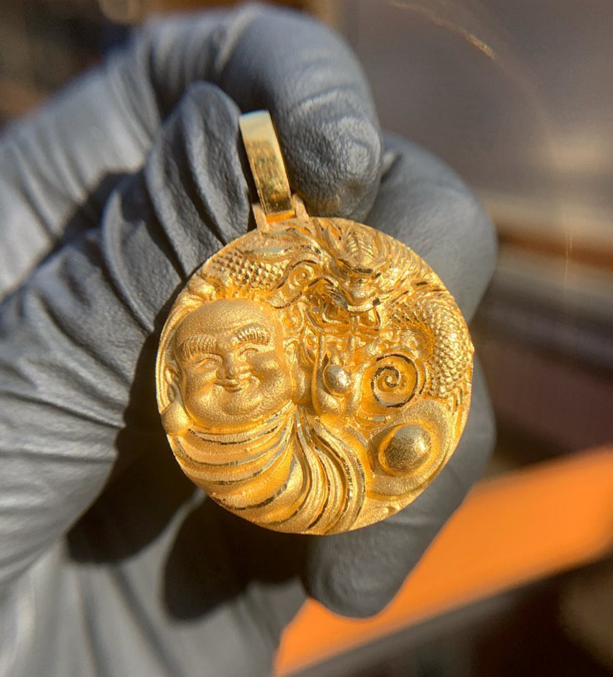 Solid gold Happy Buddha and Dragon Circular Pendant, laughing Budai sharing the disc with a coiled dragon