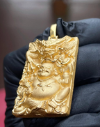 Laughing Buddha and Dragon gold pendant, side view showing the thickness of the plate and the depth of the relief