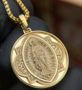 Gold Miraculous Medal pendant, the Virgin Mary in satin relief inside a polished Gothic star frame