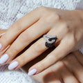Silver 925 Rhodium and Black Rhodium Plated Intertwined Black and Clear CZ Heart Ring - STR00025