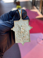 Solid gold Saint Michael Archangel pendant, cross-shaped plate with the Archangel in deep relief over a carved flame ground