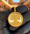 Solid gold Serpent in the Tree Circular Pendant, tree of life with a serpent coiled up the trunk inside a scaled snake-body frame