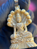 Solid gold Thai Buddha Phra Nak Prok pendant, front view of the Buddha seated in meditation beneath a fanned naga hood