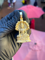 Thai Buddha Phra Nak Prok gold pendant, full front view showing the tiered lotus pedestal and crowned rasmi finial