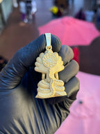 Thai Buddha Phra Nak Prok gold pendant reverse, coiled scaled naga body with lotus rosette dharma wheel