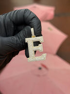 Diamond Block E pendant in yellow gold, the letter fully pave-set in double rows of round diamonds