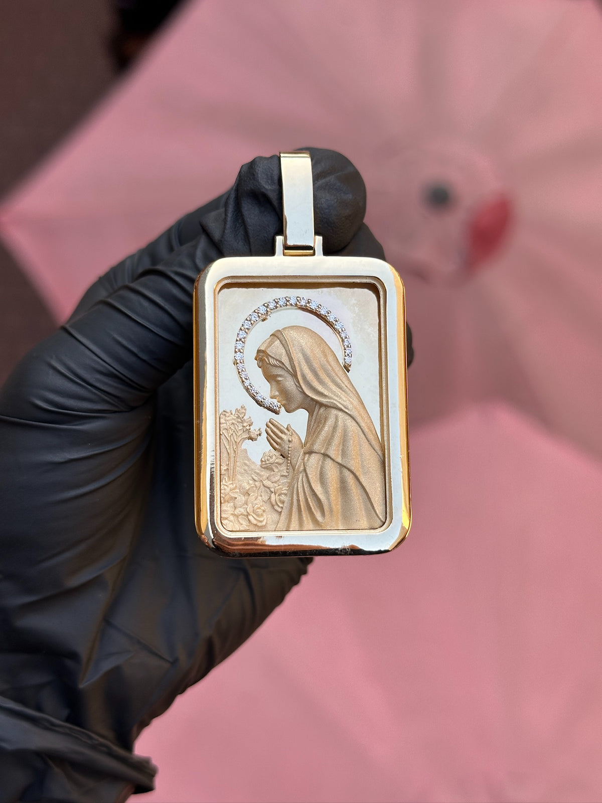 Diamond Virgin Mary rectangular pendant in gold, satin carved Madonna with a pave halo inside a plain polished border