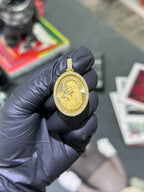 Double-sided Jesus and Virgin Mary diamond pendant, fluted sunburst ground inside a double row of pave
