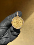 Musa of Mali diamond circular pendant, Mansa Musa portrait with raised legend and dates in a pave rim