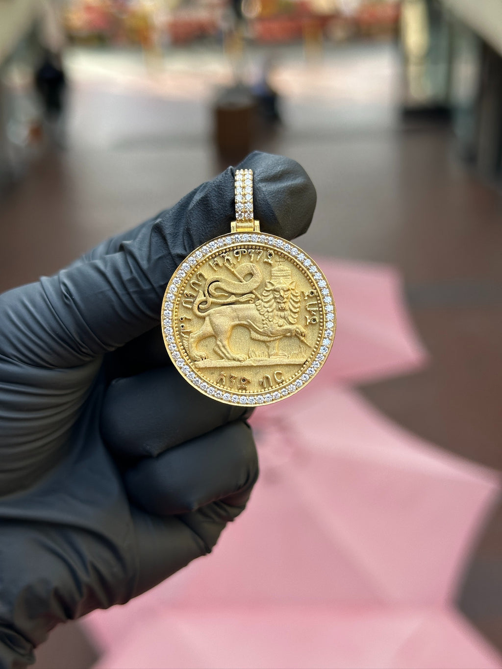 Double-sided Musa of Mali and Lion of Judah diamond pendant in gold, chevron and beaded borders