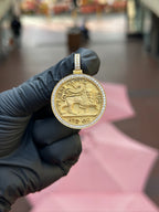 Double-sided Musa of Mali and Lion of Judah diamond pendant in gold, chevron and beaded borders