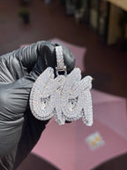 White gold "GG" Diamond Pendant, two overlapping script G letters fully pave-set in round diamonds with a traced outline and a pave-set bail.