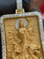 Close view of the Lady Buddha (Guan Yin) Diamond Framed Pendant showing the pave halo behind the head and the diamond-set lotus base at her feet.