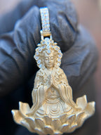 Lady Buddha (Guan Yin) Partial Diamond Pendant in satin yellow gold, seated in anjali mudra with 32 bezel-set diamonds ringing the crown and headdress.