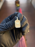 Yellow gold Mini Rectangular "W" Diamond Frame Pendant, a raised block letter W on a satin field inside a single row of round diamonds. The letter can be made as any initial.