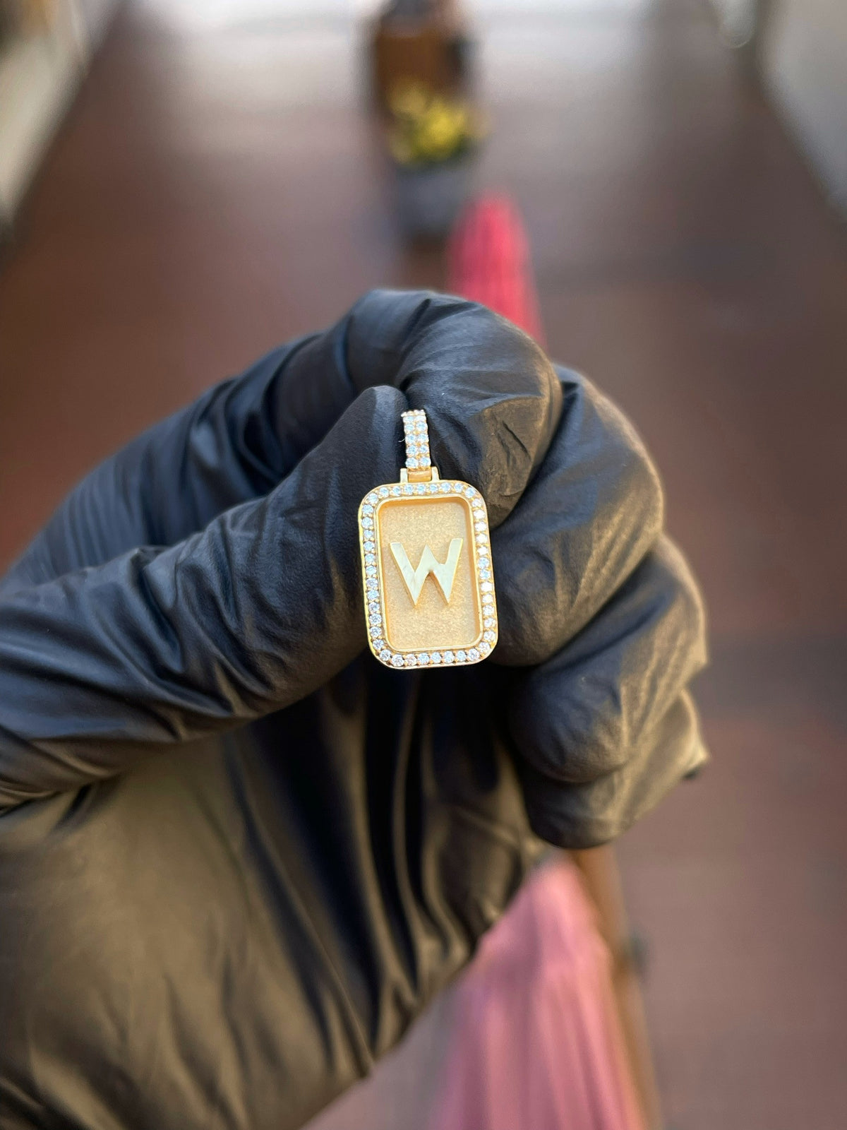 Yellow gold Mini Rectangular "W" Diamond Frame Pendant, a raised block letter W on a satin field inside a single row of round diamonds. The letter can be made as any initial.