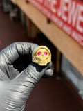 Red Eyed Santa Muerte Ring in solid gold - satin-finish hooded skull with synthetic ruby eyes