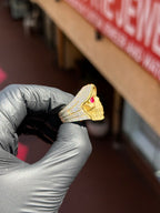 Red Eyed Santa Muerte Ring showing the diamond-outlined cowl and four rows of pave on the shoulder
