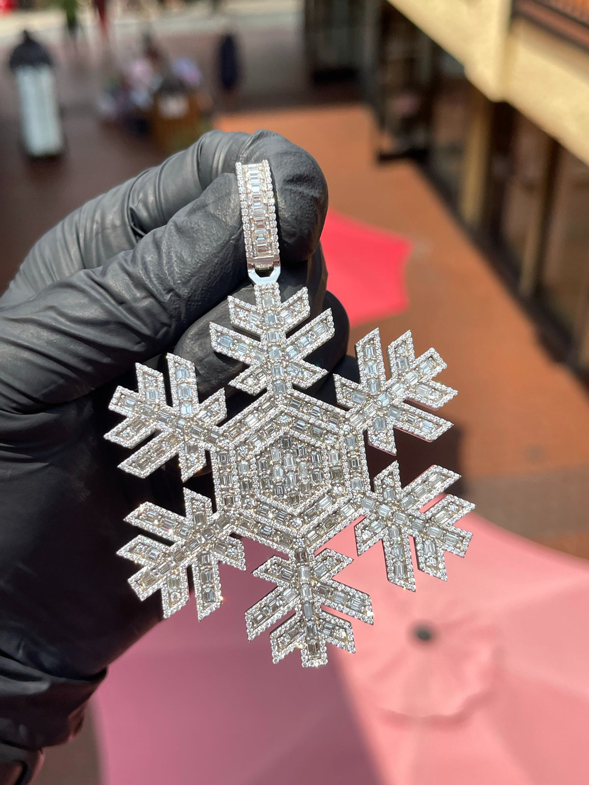 Daylight view of the Snowflake Diamond Pendant showing the full six-arm span and the branching side spurs on each arm.