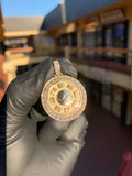 Yellow gold Taoist Bagua Circular Diamond Pendant, a polished yin-yang at the centre with eight cut trigrams on a matte field inside a single row of round diamonds.