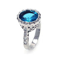 Silver 925 Rhodium Plated Clear and Blue Center CZ Ring - STR00132BLU