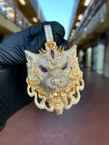 Yellow gold Wolf Fully Diamond Pendant, a wolf head pave-set across the face and mane with two red eyes and a red marquise stone set into the brow.